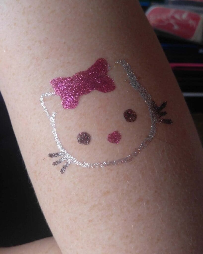 kitty glitter tattoo